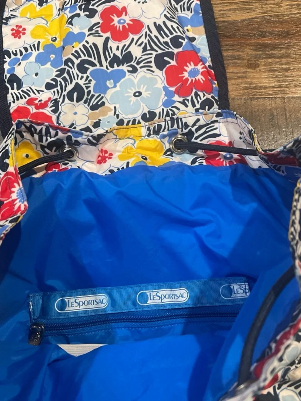 LeSportsac Floral Drawstring Backpack in Red, Blue, Yellow
